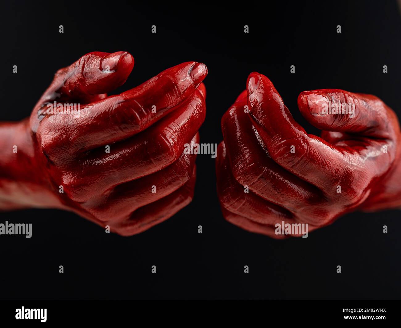 Women's hands in blood on a black background Stock Photo Alamy
