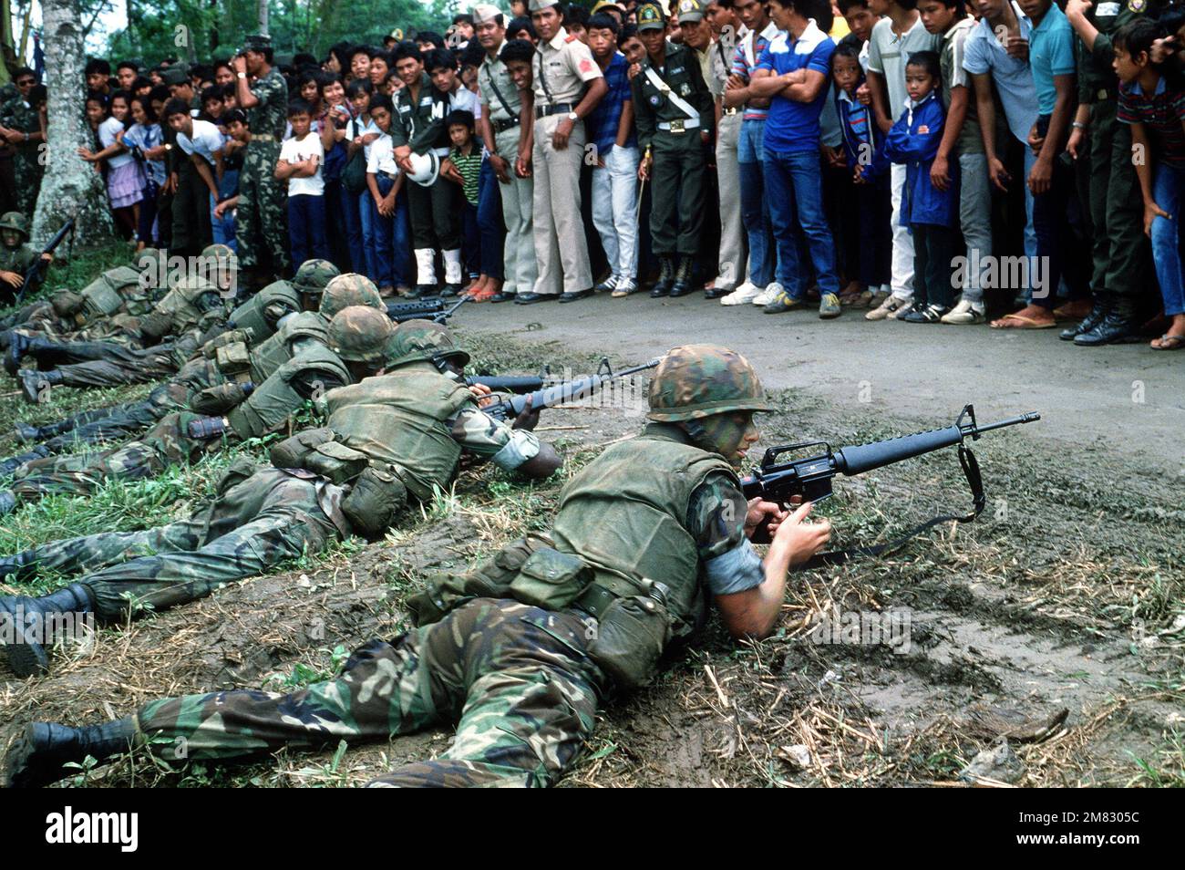 spectators-observe-marines-as-they-reenact-general-macarthur-s-landing