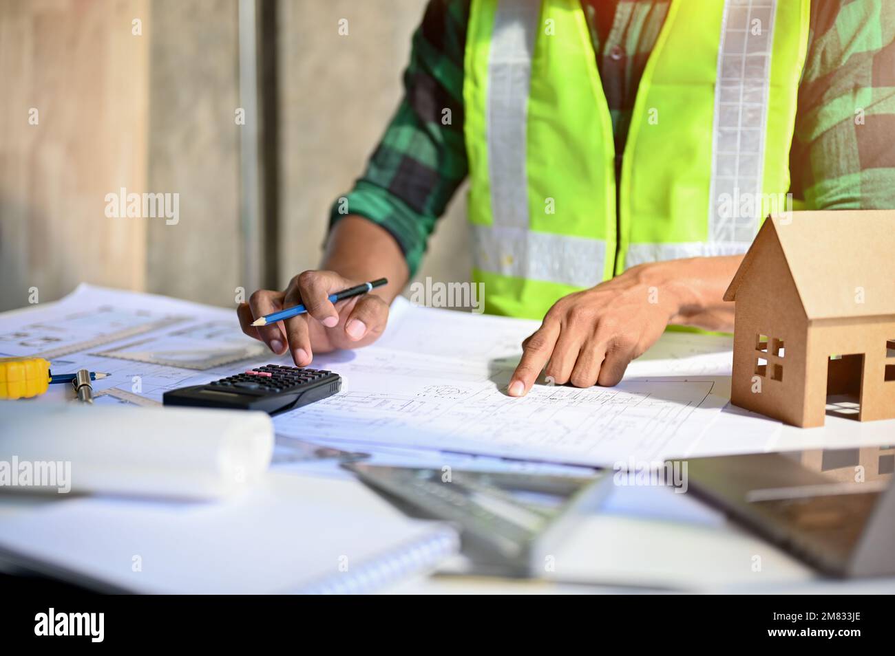 Professional Asian male construction engineer or construction site ...