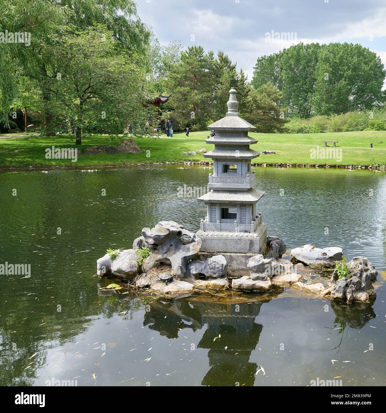 Pagoda in a lake in a Chinese garden on the outskirts of the city of ...