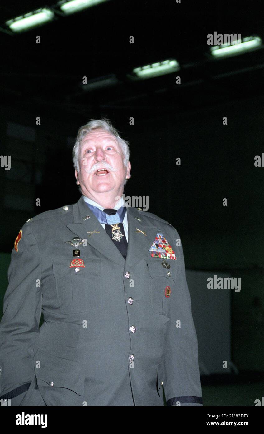 Retired COL. Lewis Millett, a recipient of the Medal of Honor during the Korean War, speaks to members of his former unit, the 27th Inf., 25th Inf. Div., during the joint U.S./South Korean exercise Team Spirit '85. Subject Operation/Series: TEAM SPIRIT '85 Base: Camp Page State: Chun Chow Country: Korea Stock Photo