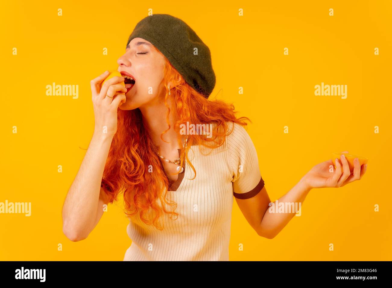Girl in a yellow beret hi-res stock photography and images - Alamy