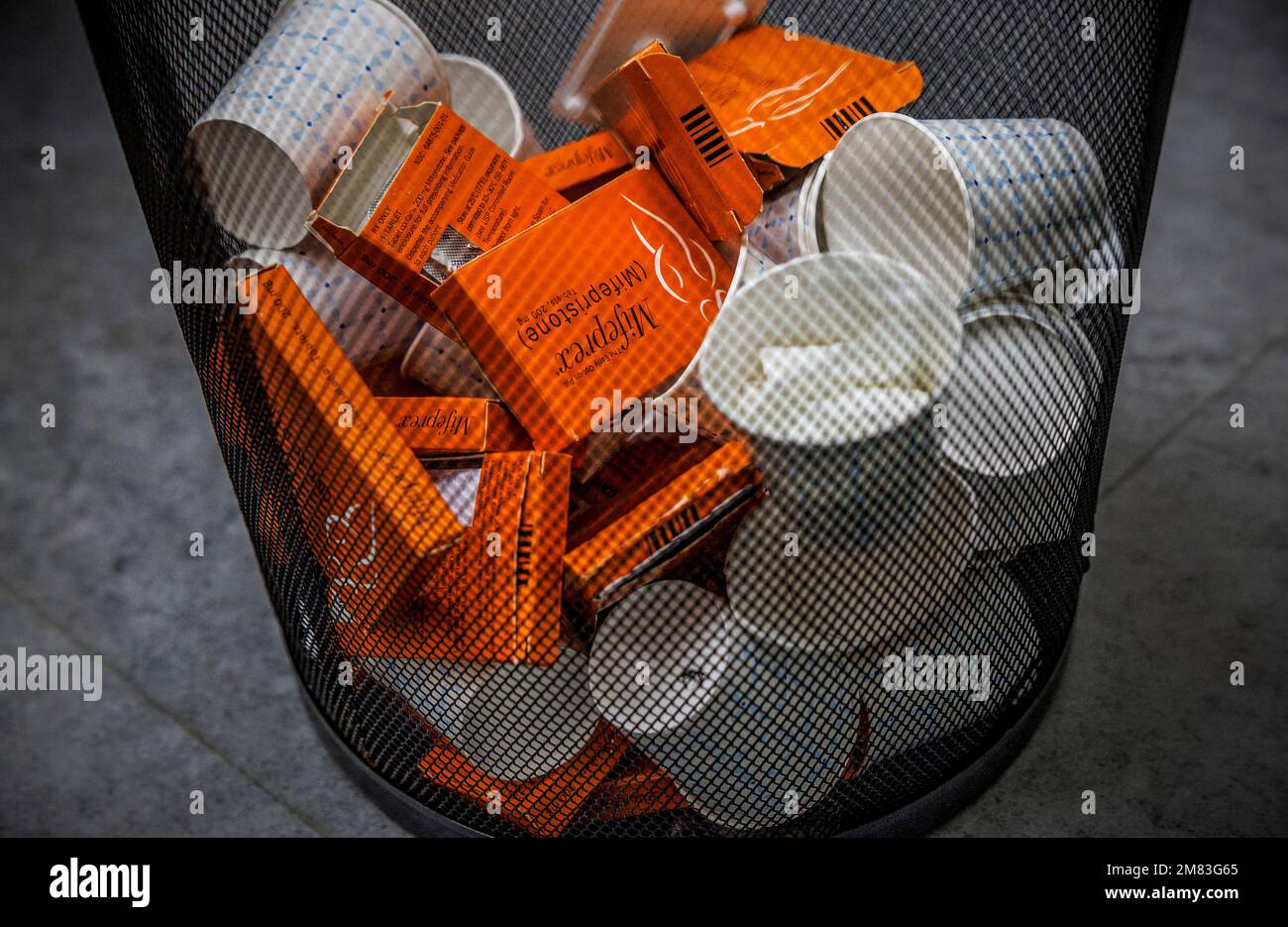 Used boxes of Mifepristone pills, the first drug used in a medical abortion, fill a trash at Alamo Women's Clinic in Albuquerque, New Mexico, U.S., January 11, 2023. REUTERS/Evleyn Hockstein Stock Photo