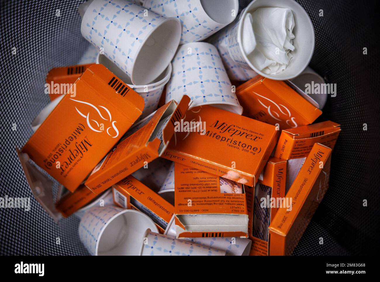 Used boxes of Mifepristone pills, the first drug used in a medical abortion, fill a trash at Alamo Women's Clinic in Albuquerque, New Mexico, U.S., January 11, 2023. REUTERS/Evleyn Hockstein Stock Photo
