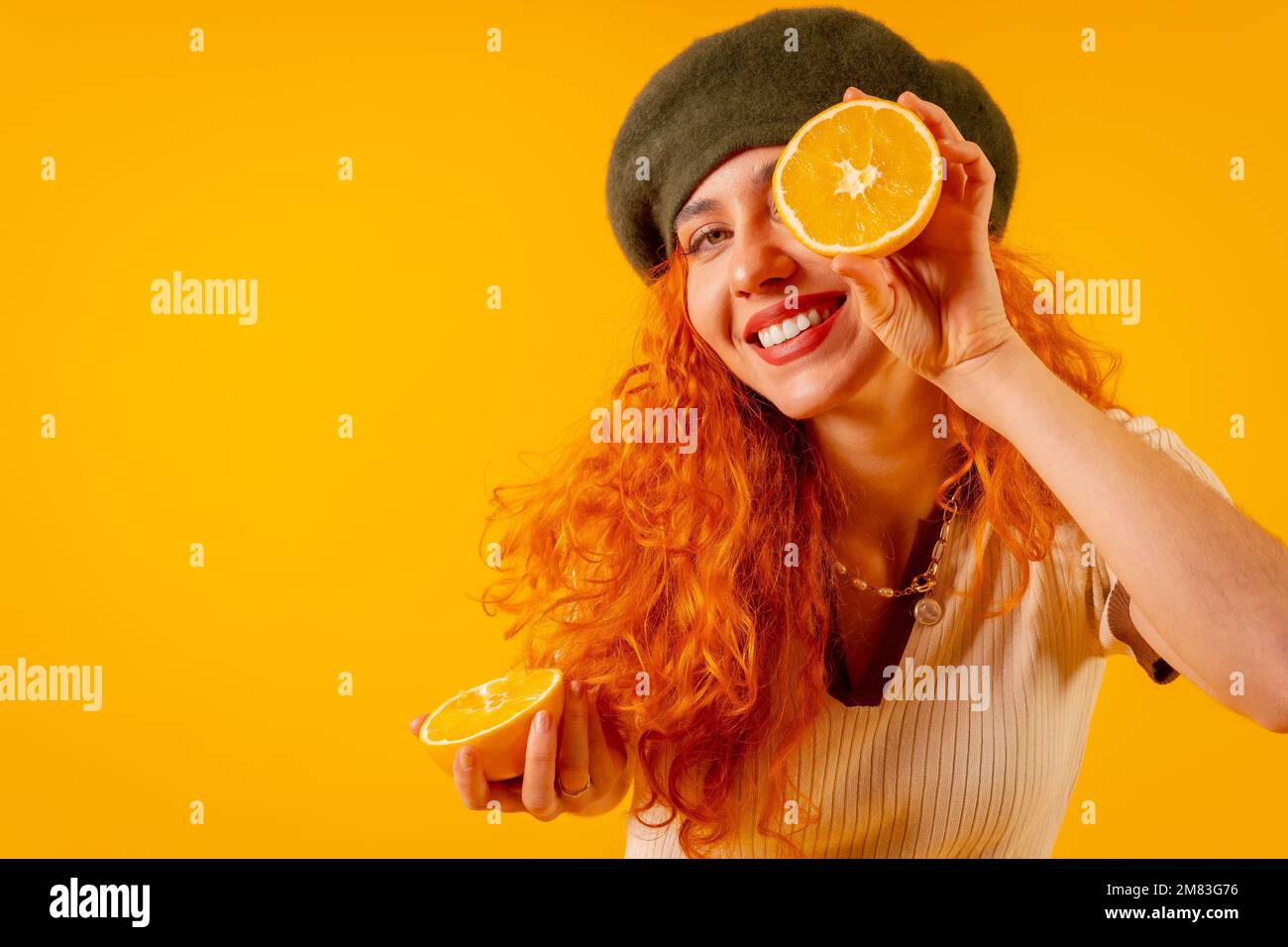 Girl in a yellow beret hi-res stock photography and images - Alamy