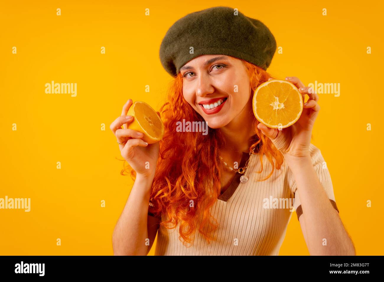 Girl in a yellow beret hi-res stock photography and images - Alamy