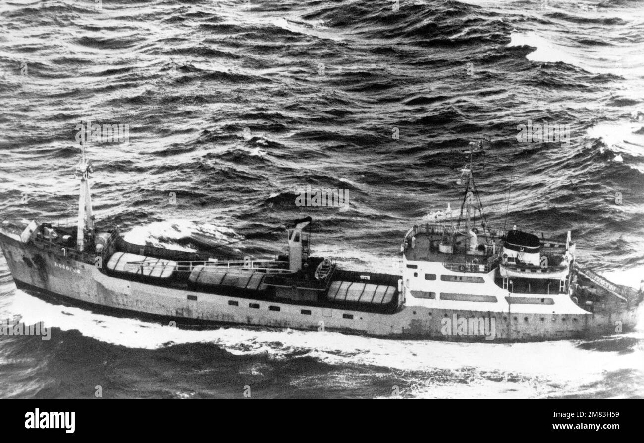 Aerial port beam view of a Soviet MP6 class cargo ship underway