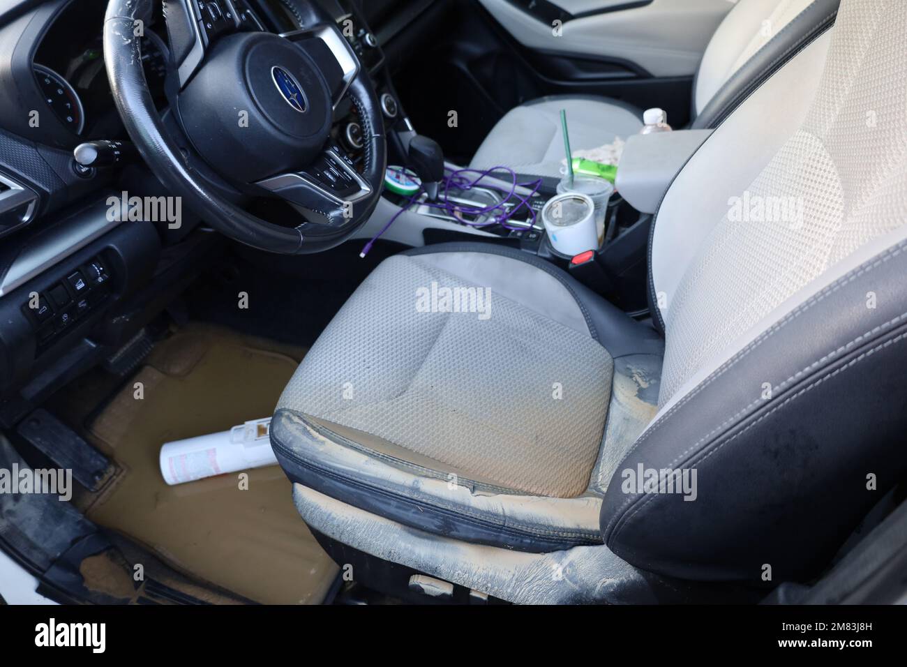 Santa Barbara, California, U.S.A. 11th Jan, 2023. A white, 2019 Suburu Forester on January 11, 2023, with All-wheel drive and X-Mode activated, was no match for a mountain stream that gushed across the Rancho Oso Horse Ranch and Campground driveway in the Los Padres National Forest. T.Context: The Santa Barbara Fire department pulled it out of the muck and parked it out of the way of other vehicles, but a tow truck has not been able to reach it. AAA Insurance agents have not been able to have it inspected, but expect it will be a total loss, as one explained, 'When a newer car is submerg Stock Photo