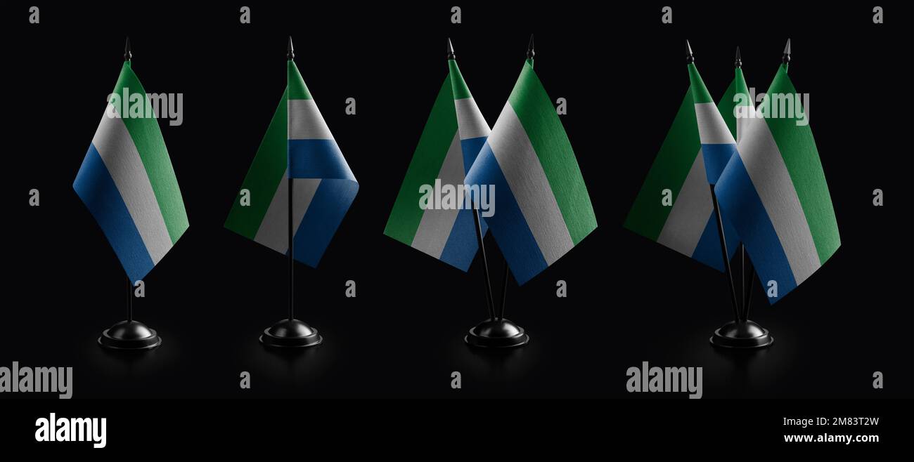Small national flags of the Sierra Leone on a black background Stock ...