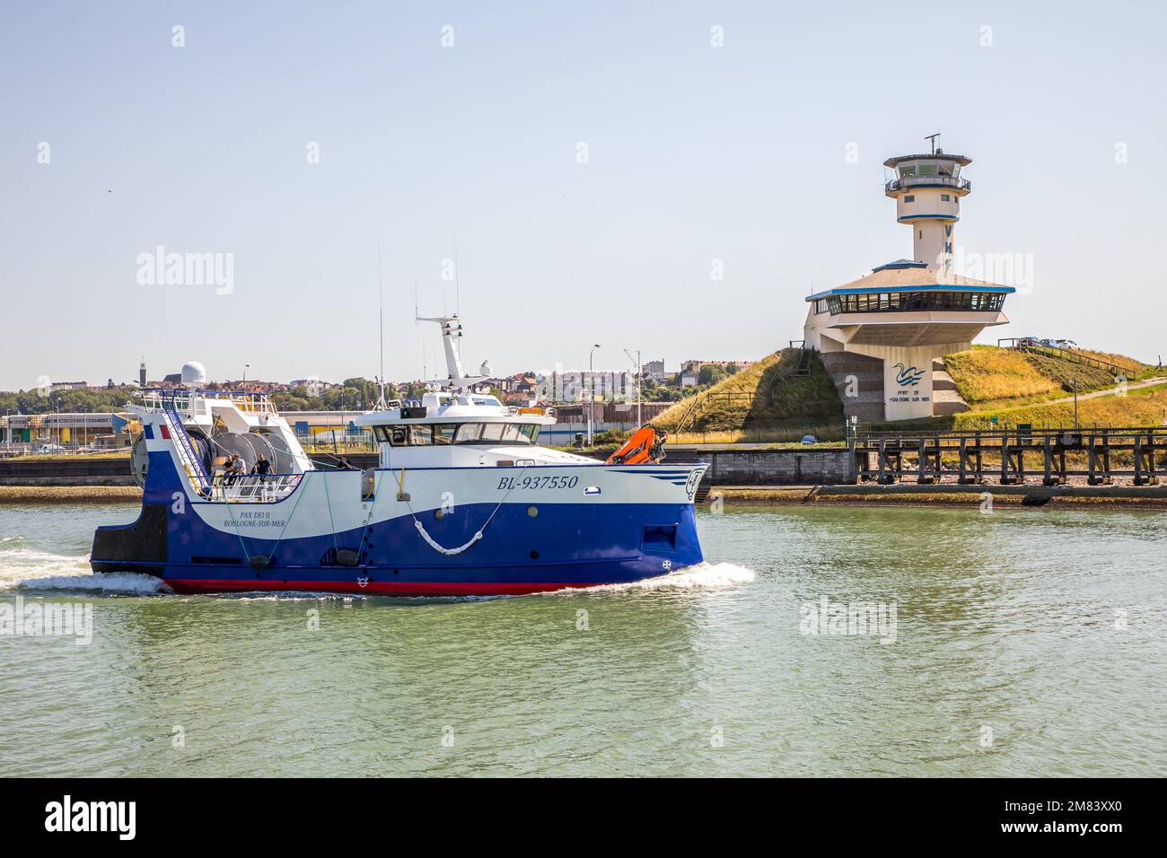 TRAWLER AND HARBOUR MASTER'S OFFICE ON THE PORT OF BOULOGNE SUR MER, (62) PAS-DE-CALAIS, FRANCE Stock Photo