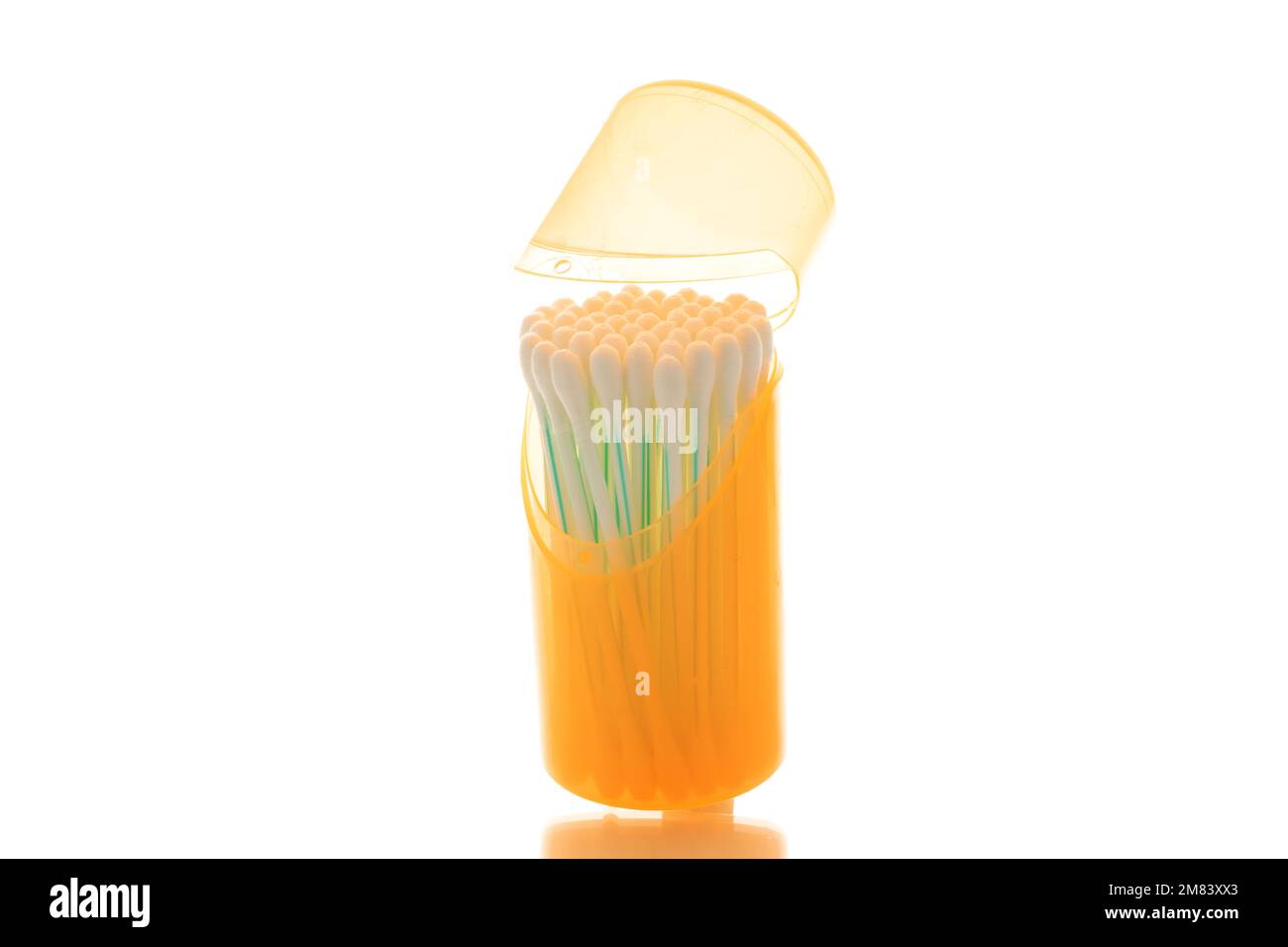 Ear sticks in plastic container, macro, isolated on white background