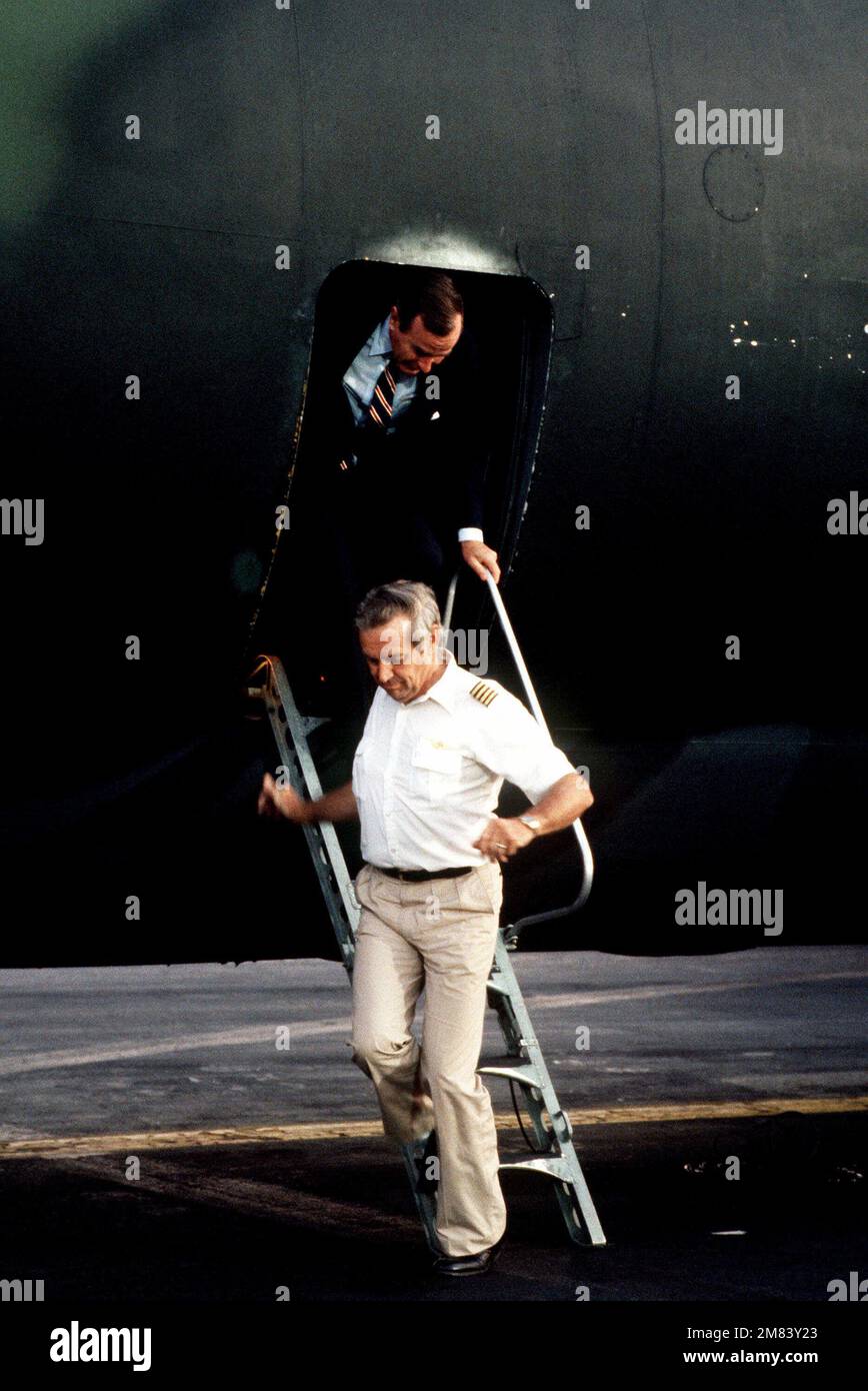 TWA Captain John Testrake is the first to exit from a C-141B Starlifter ...