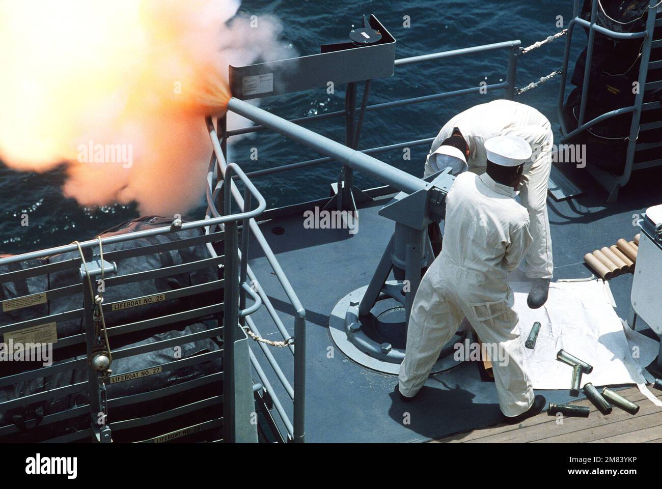 GUNNER's mates fire a round from a saluting gun aboard the battleship USS  IOWA (BB 61). Base: USS Iowa (BB 61) Country: Atlantic Ocean (AOC Stock  Photo - Alamy, image size:1300x961
