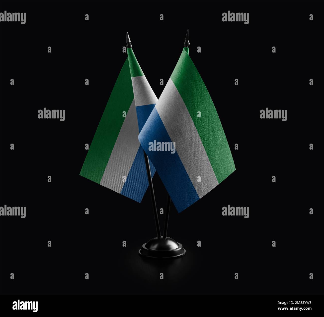 Small national flags of the Sierra Leone on a black background Stock ...
