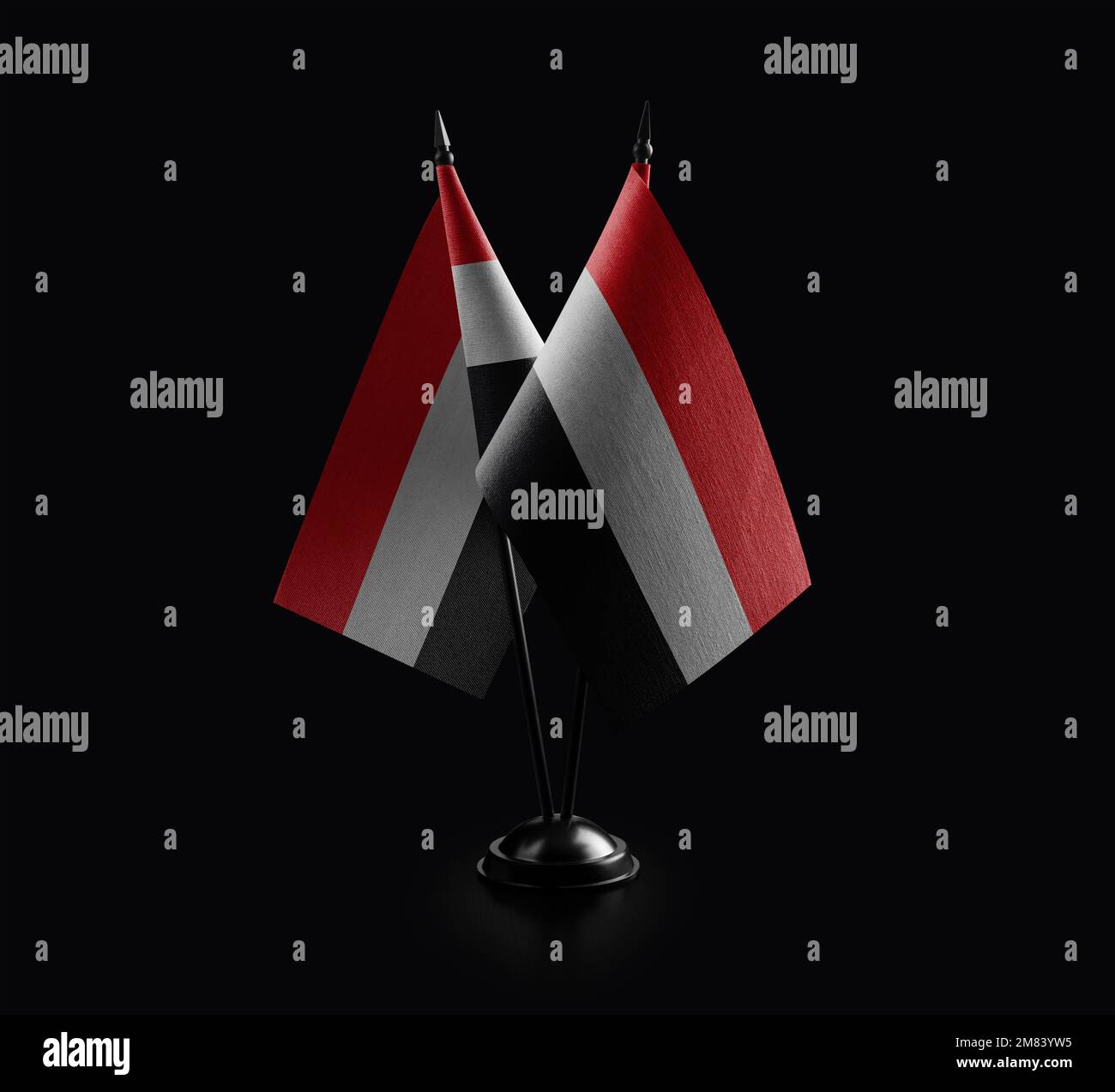 Small national flags of the Yemen on a black background Stock Photo - Alamy
