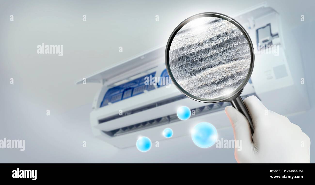 Dust and dirty inside of an air conditioner filter through a magnifying