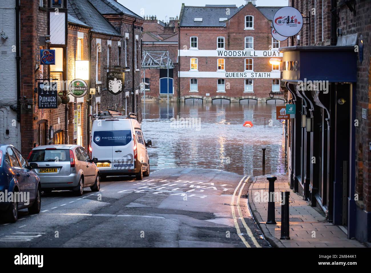 York, UK. 12th Jan, 2023. Local business are flooded as heavy rain ...