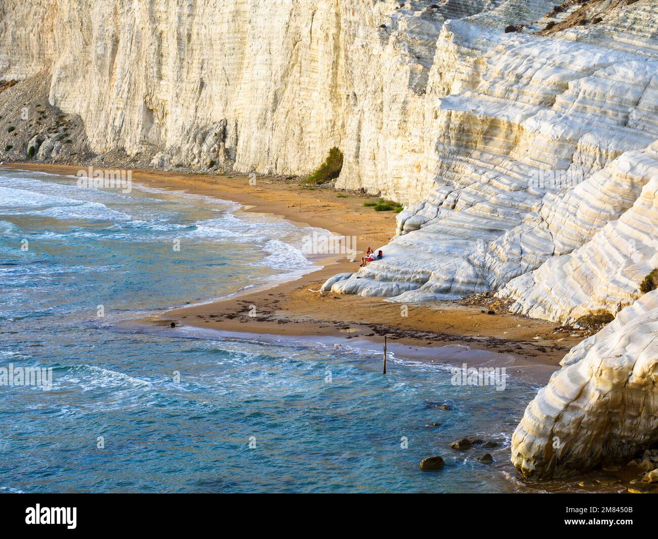 The Scala dei Turchi (Stair of the Turks) is a rocky cliff on the coast of Realmonte formed by marl, a sedimentary rock with a characteristic white color, formed from the tests of planktonic foraminifera. Agrigento, Sicily , Italy Stock Photo