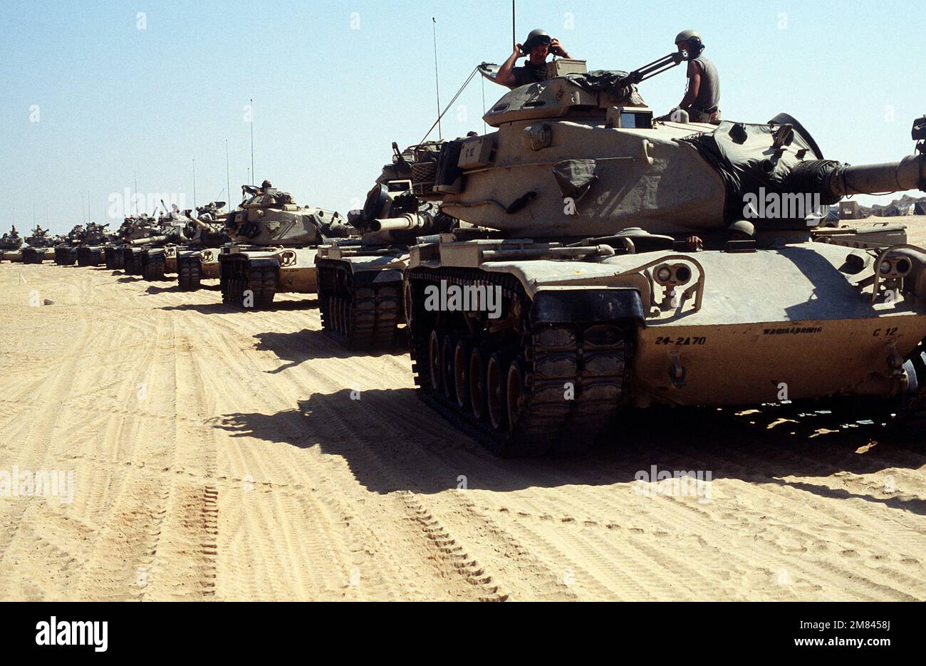 M-60 main battle tanks parked in formation prepare for armored vehicle operations during the multinational joint service exercise Bright Star '85. Subject Operation/Series: BRIGHT STAR '85 Base: Gamel Mazma Country: Egypt (EGY) Stock Photo