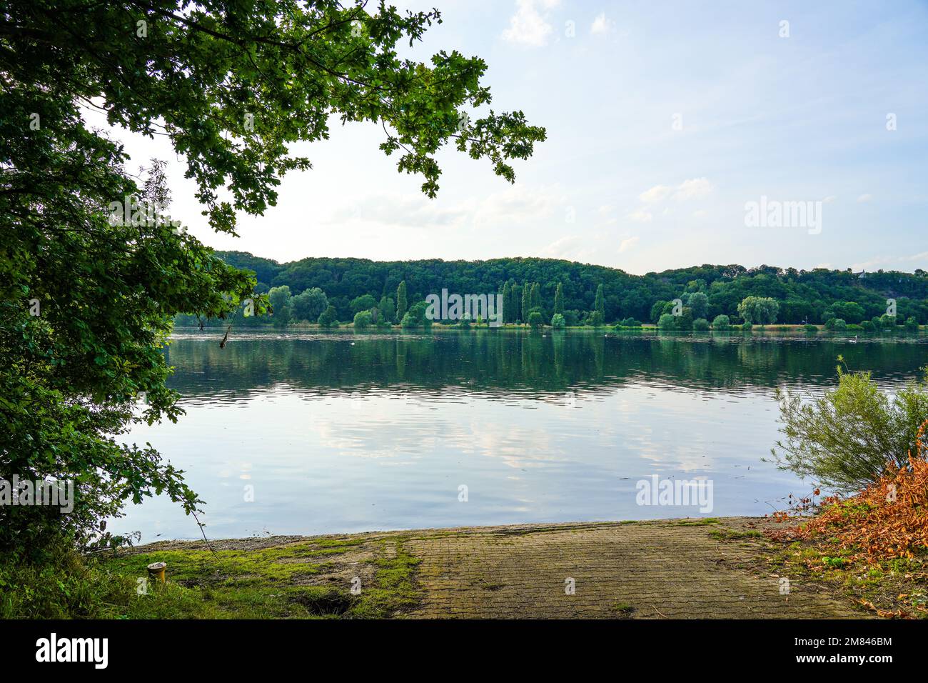 Kemnader See in the evening. Ruhr reservoir with surrounding nature. Landscape with a lake near Bochum in the Ruhr area. Stock Photo