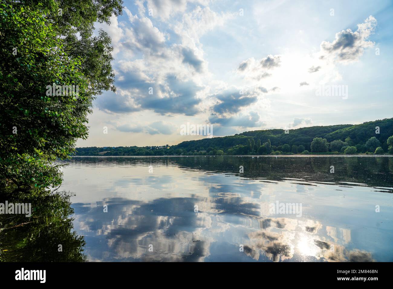 Kemnader See in the evening. Ruhr reservoir with surrounding nature. Landscape with a lake near Bochum in the Ruhr area. Stock Photo