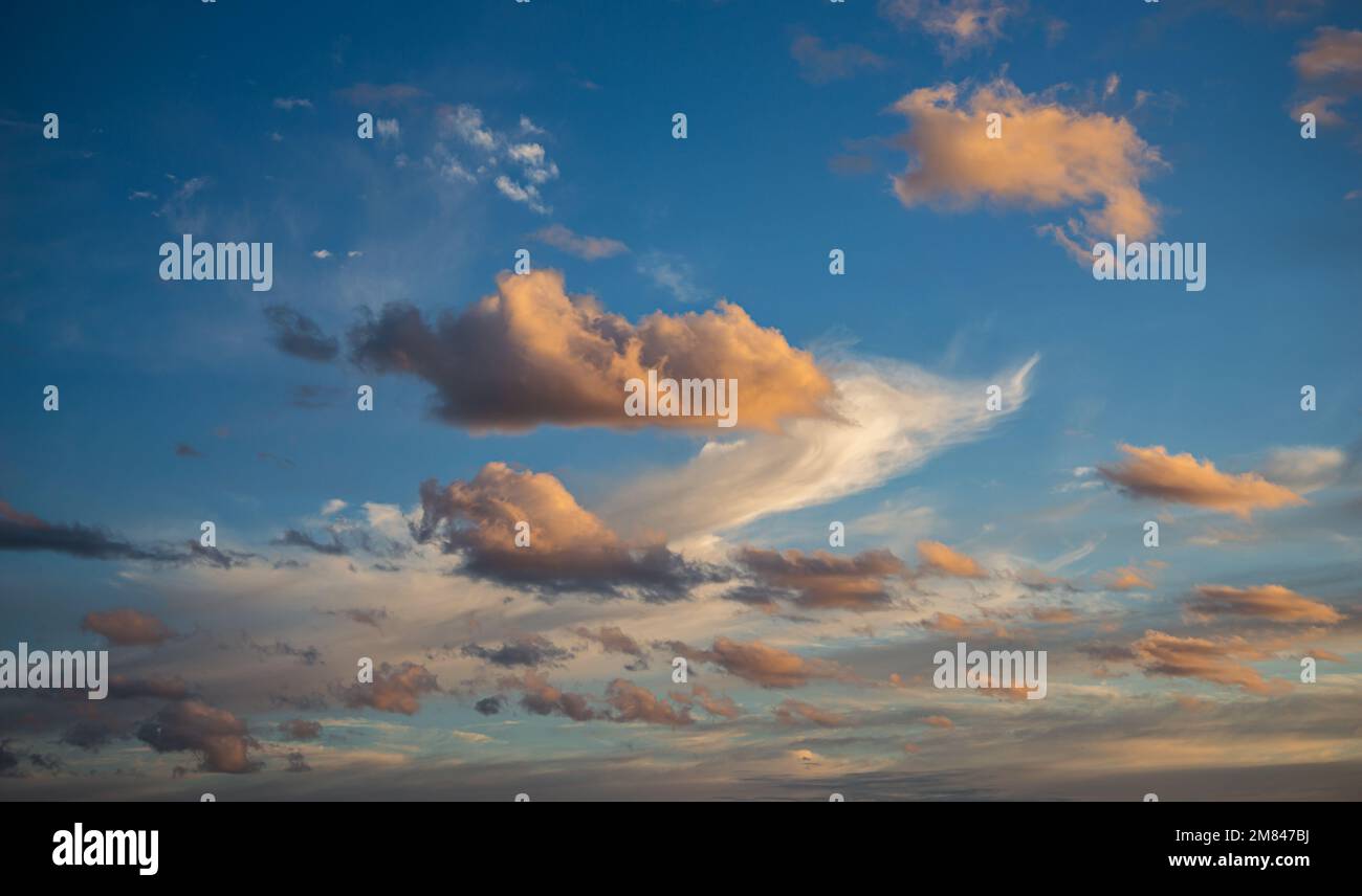 Sunset sky with orange clouds. Nature background Stock Photo - Alamy