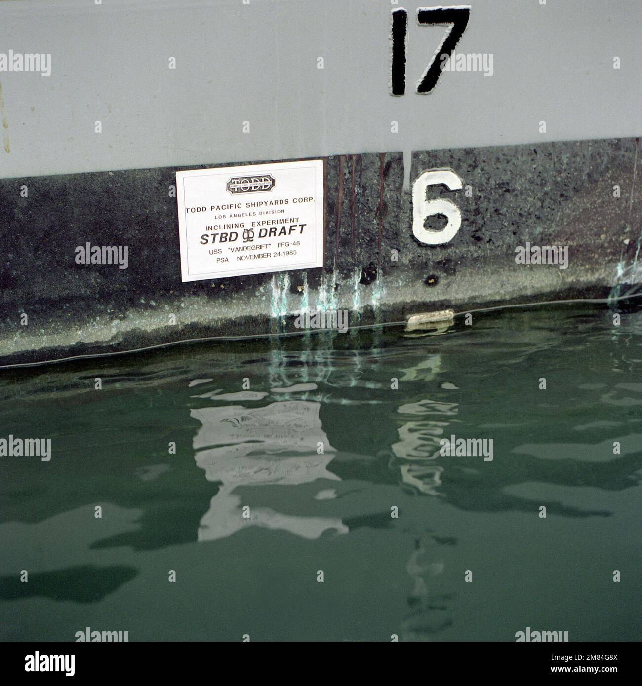 A plaque at the waterline of the guided missile frigate USS VANDEGRIFT (FFG-48) during an inclining test. Base: Los Angeles State: California (CA) Country: United States Of America (USA) Stock Photo