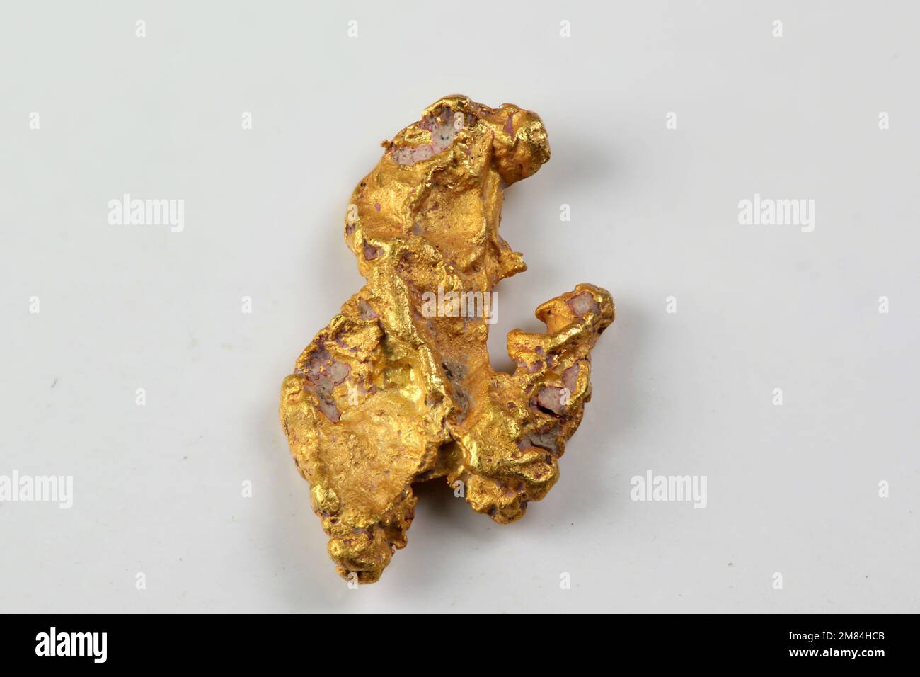 Gold nugget in hand hi-res stock photography and images - Alamy
