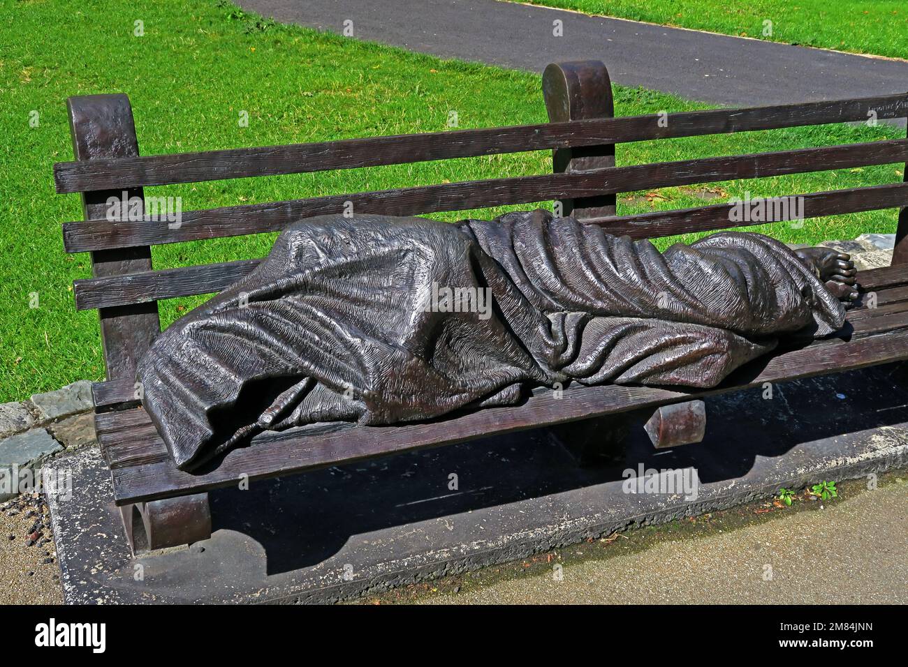 Homeless Jesus sculpture,, at Christ Church cathedral Dublin - by Canadian artist, Tim Schmalz, installed 2016 Stock Photo