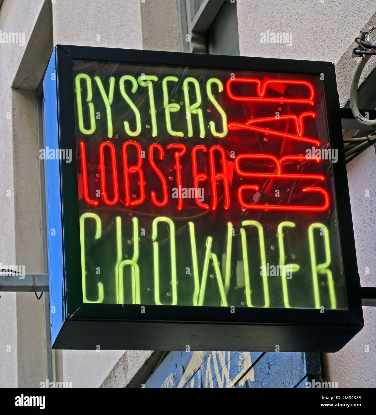 Neon sign, Oysters, crab, lobster, chowder - all types of seafood Stock Photo