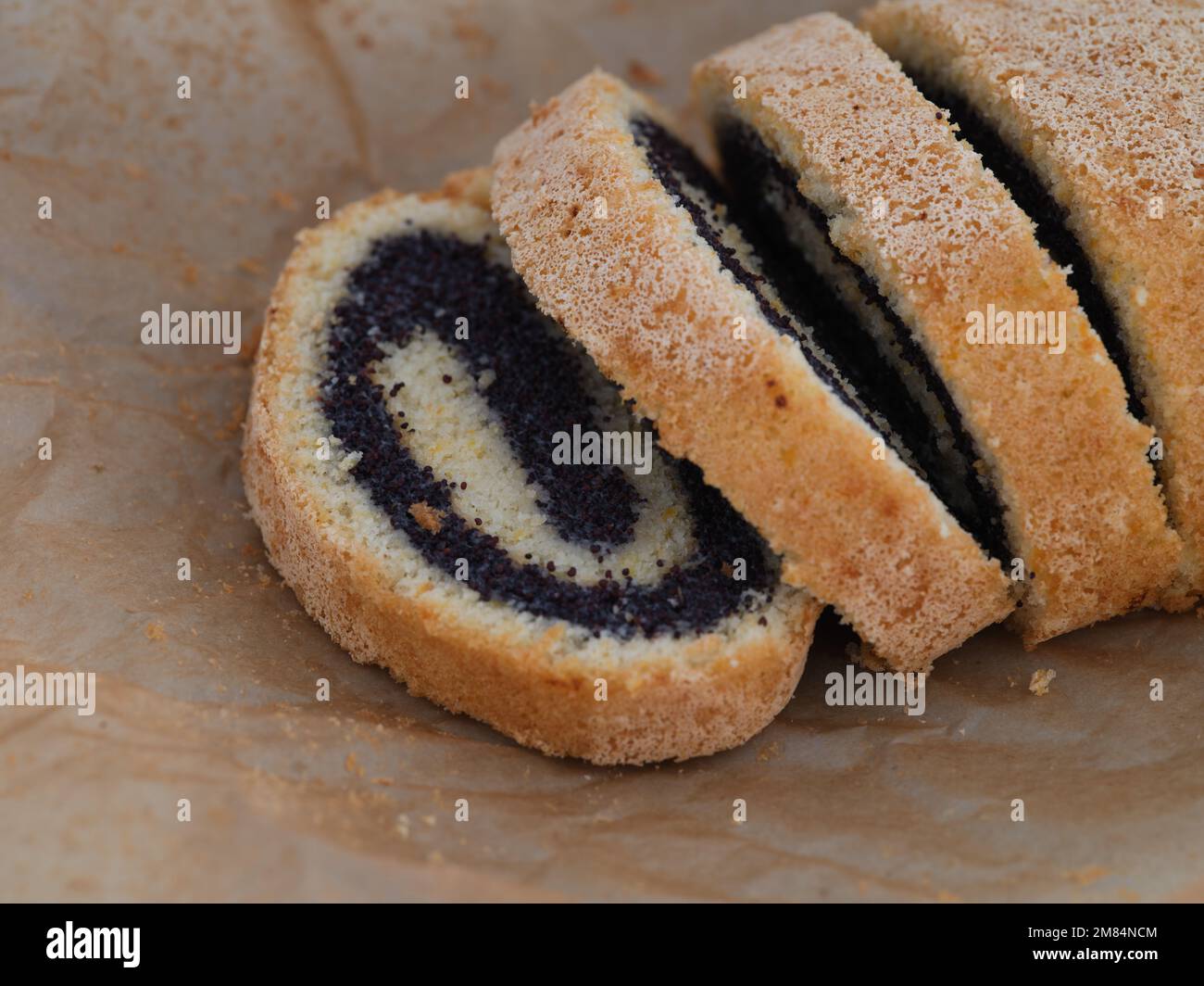 A delicious poppy seed roll. Close up. Stock Photo