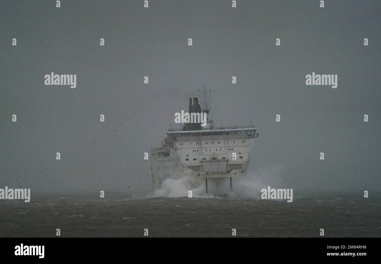 An Irish Ferries ferry arrives at the Port of Dover in Kent during bad