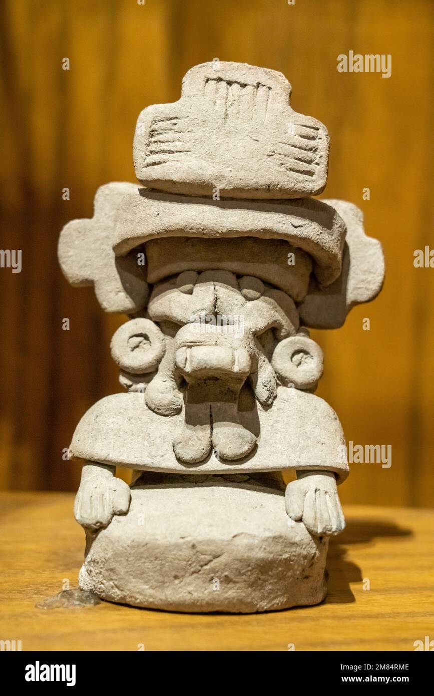 A pre-Hispanic Zapotec ceramic figure of Cocijo, the Rain God, in the Museum of Oaxacan Culture, Oaxaca, Mexico. Stock Photo