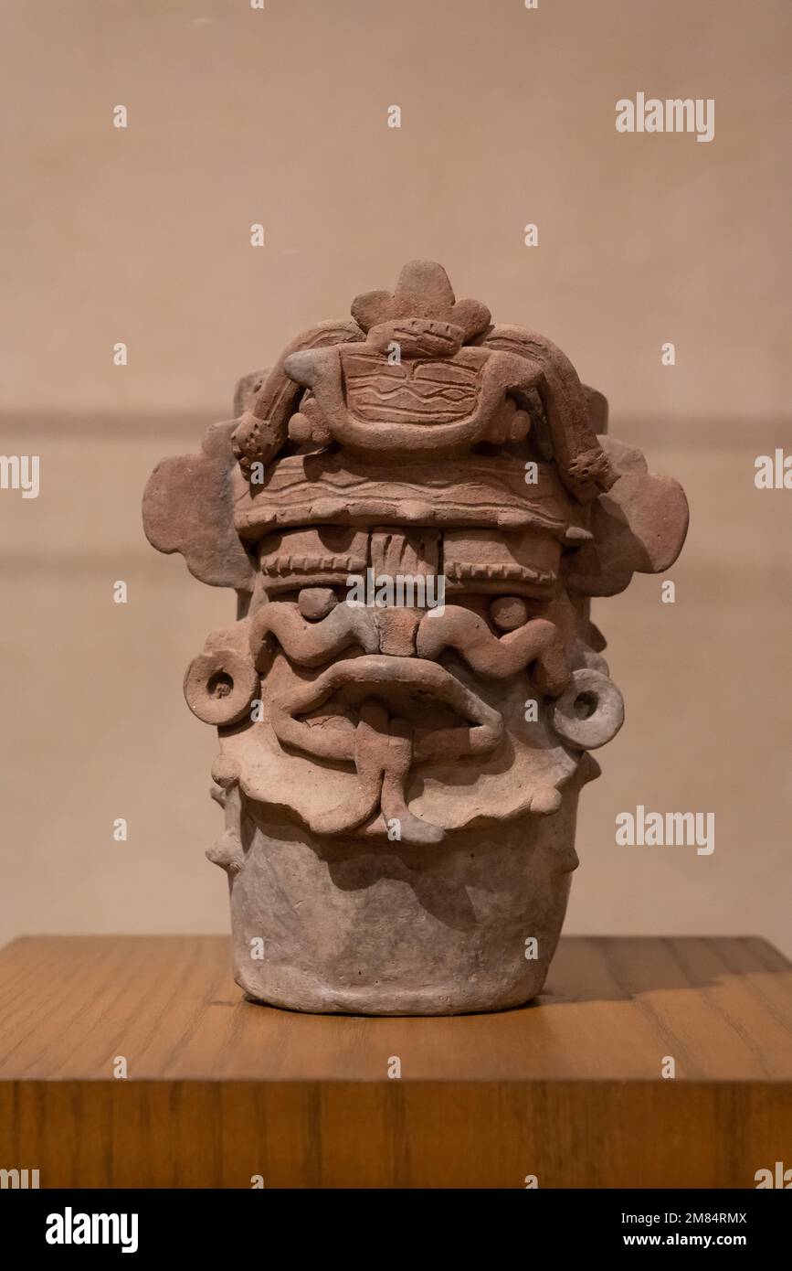 Ceramic funerary urn in the form of Cocijo, the Zapotec god of lightning.  Museum of Oaxacan Culture, Oaxaca, Mexico. Stock Photo
