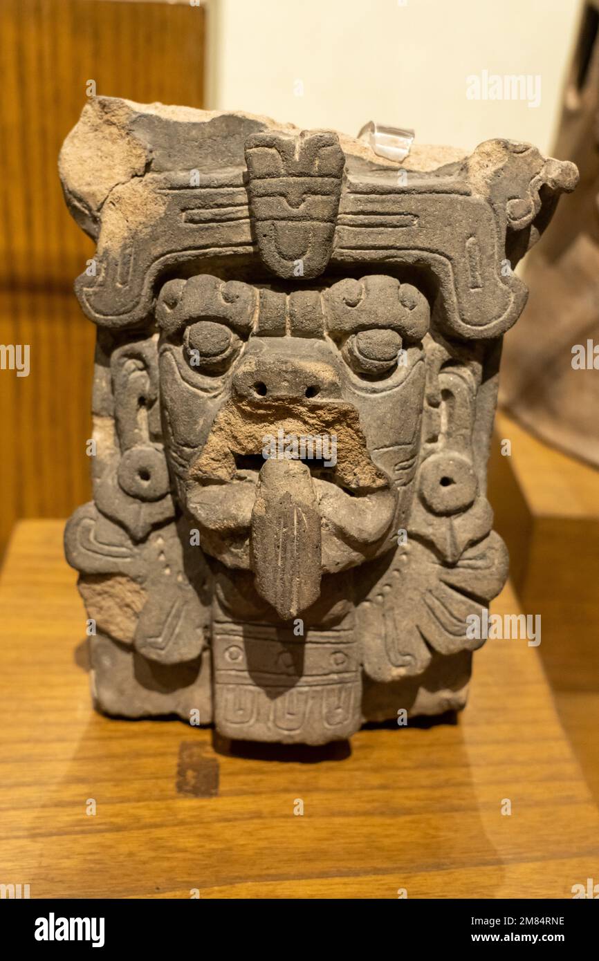Pre-Hispanic ceramic Zapotec funerary figure of Cocijo, the god of rain, in the Museum of Oaxacan Culture, Oaxaca, Mexico. Stock Photo