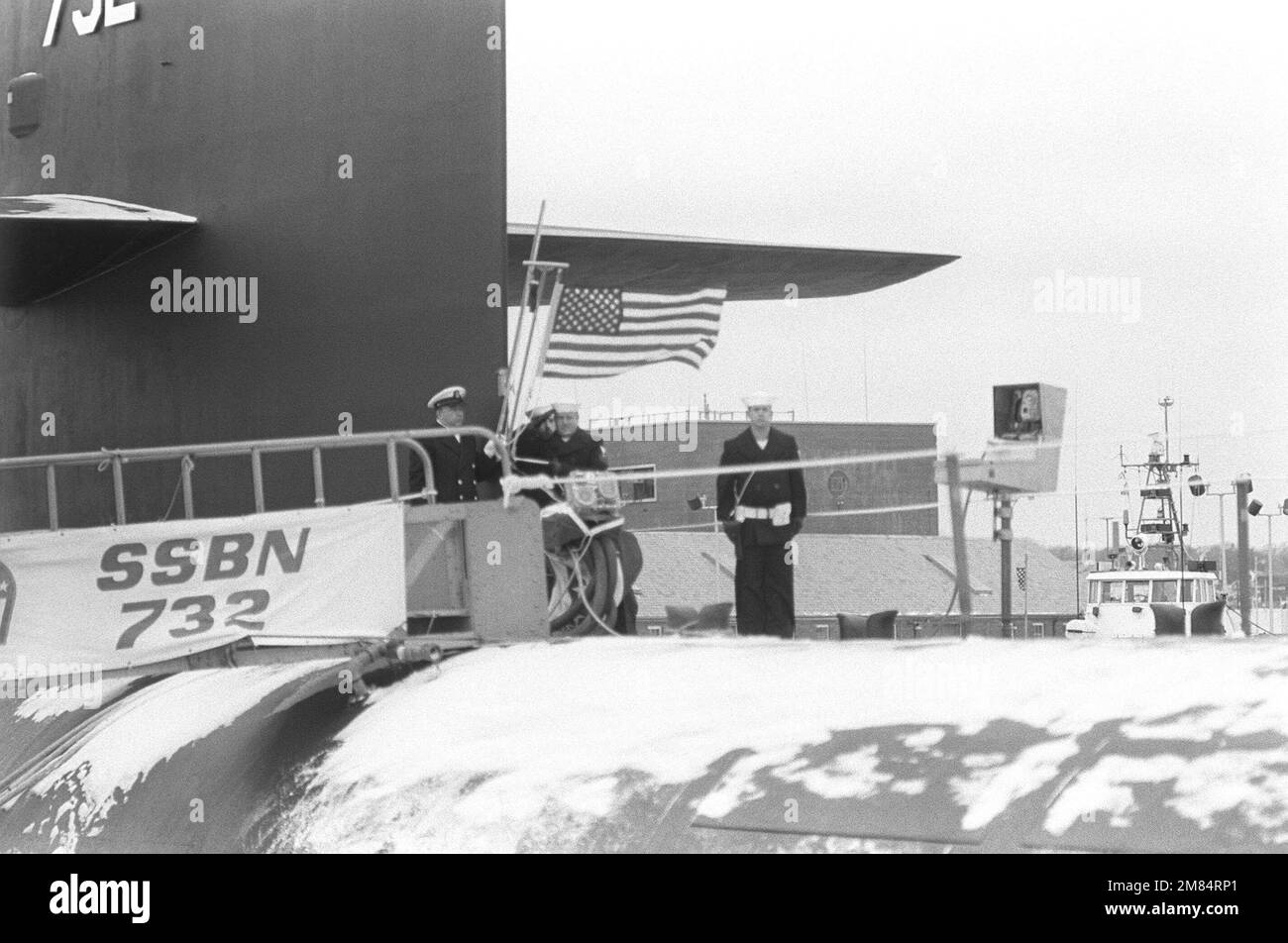 The ensign is raised aboard the nuclearpowered strategic missile