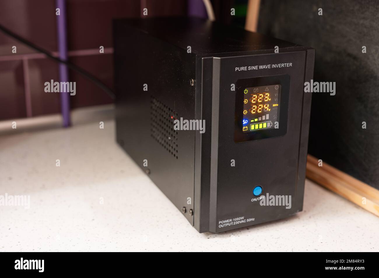 Pure sine wave inverter. Backup Power UPS 1000 W with stabilizer for home. Stock Photo