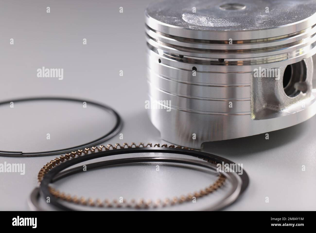 Spare part engine piston and rings for auto repair Stock Photo Alamy
