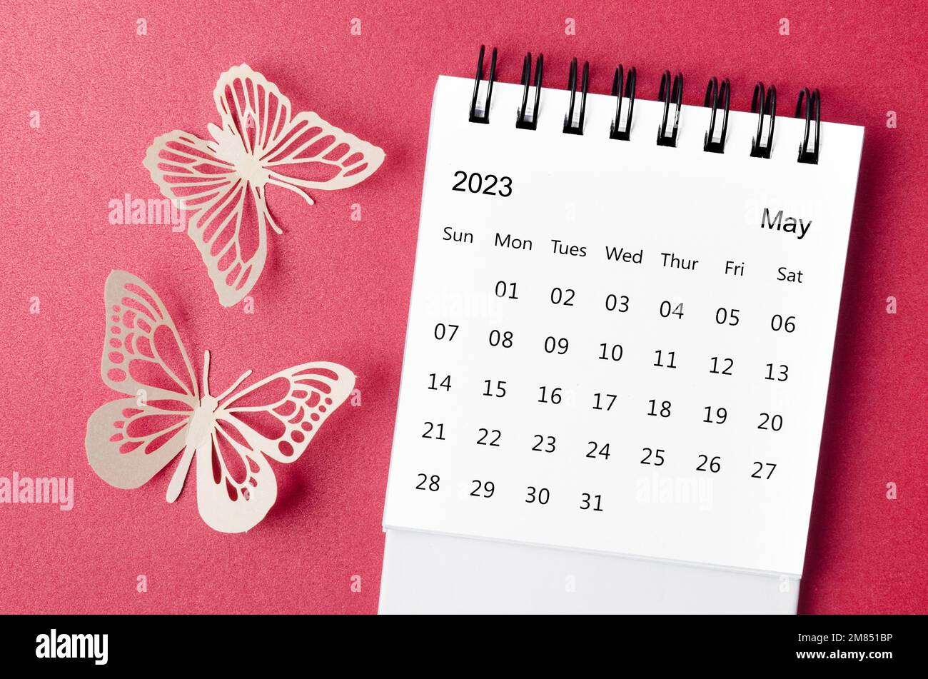 May 2023 desk calendar for the organizer to plan and reminder with paer butterfly on red background Stock Photo - Alamy May 2023 desk calendar for the organizer to plan and reminder with paer butterfly on red background Stock Photo - Alamy