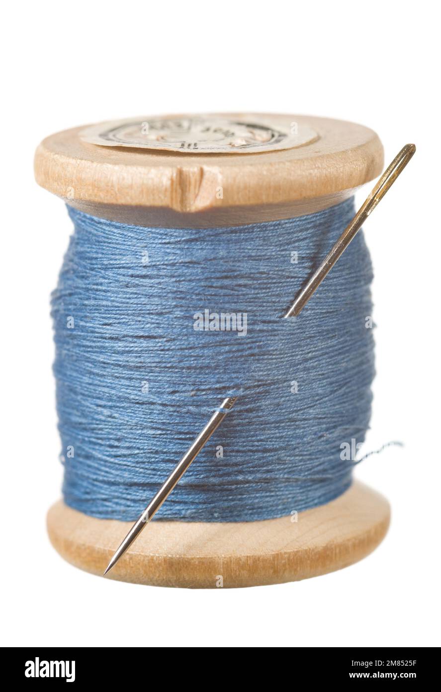 Vintage wooden reel of thread on white Stock Photo - Alamy