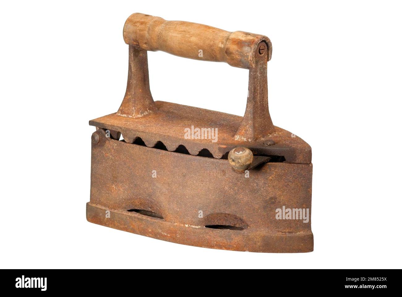 A vintage rusty carbons heated iron isolated on white. Stock Photo