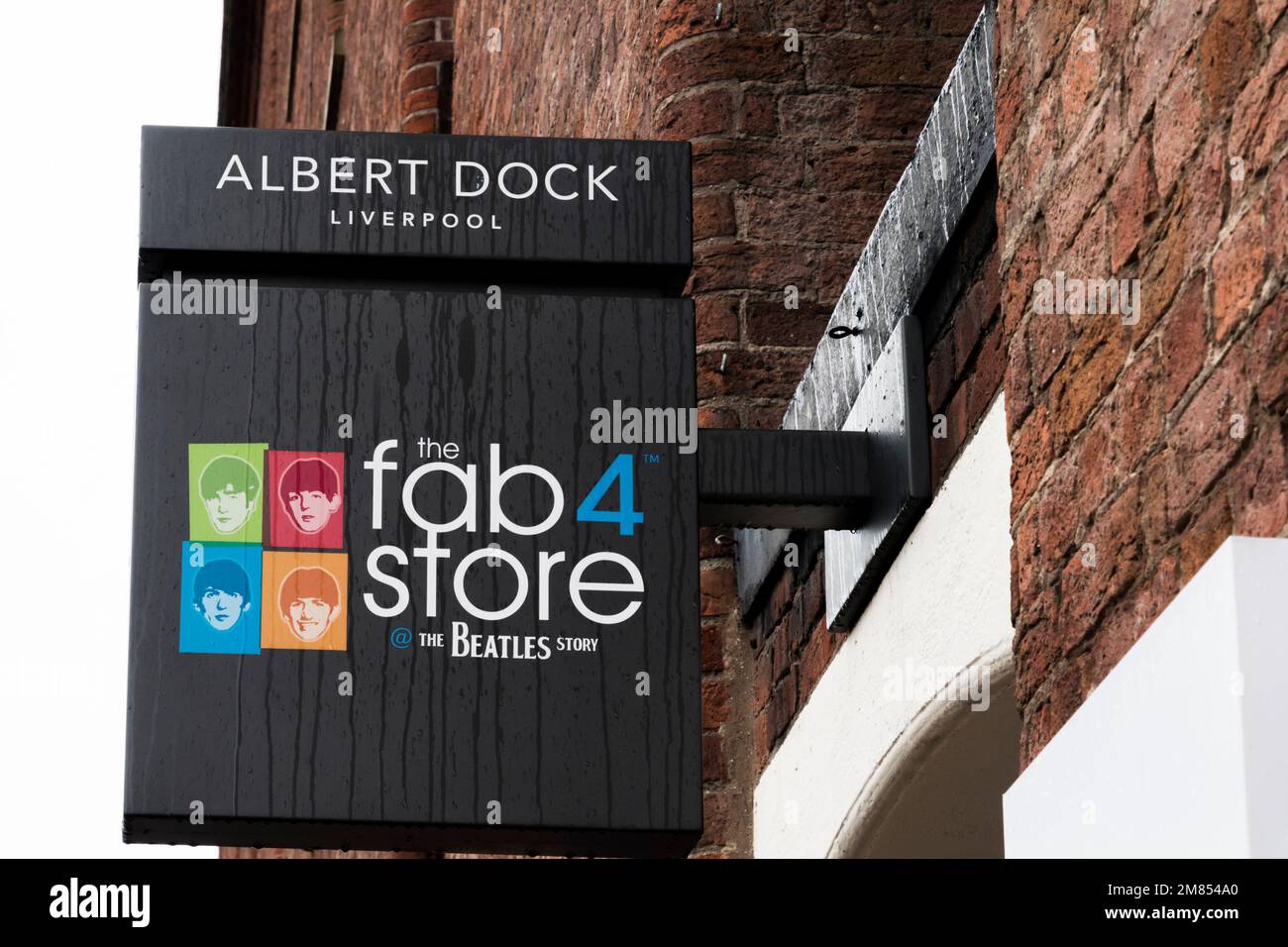 Sign for the Fab4 Store, the Beatles Story in Albert Dock, Liverpool. Stock Photo