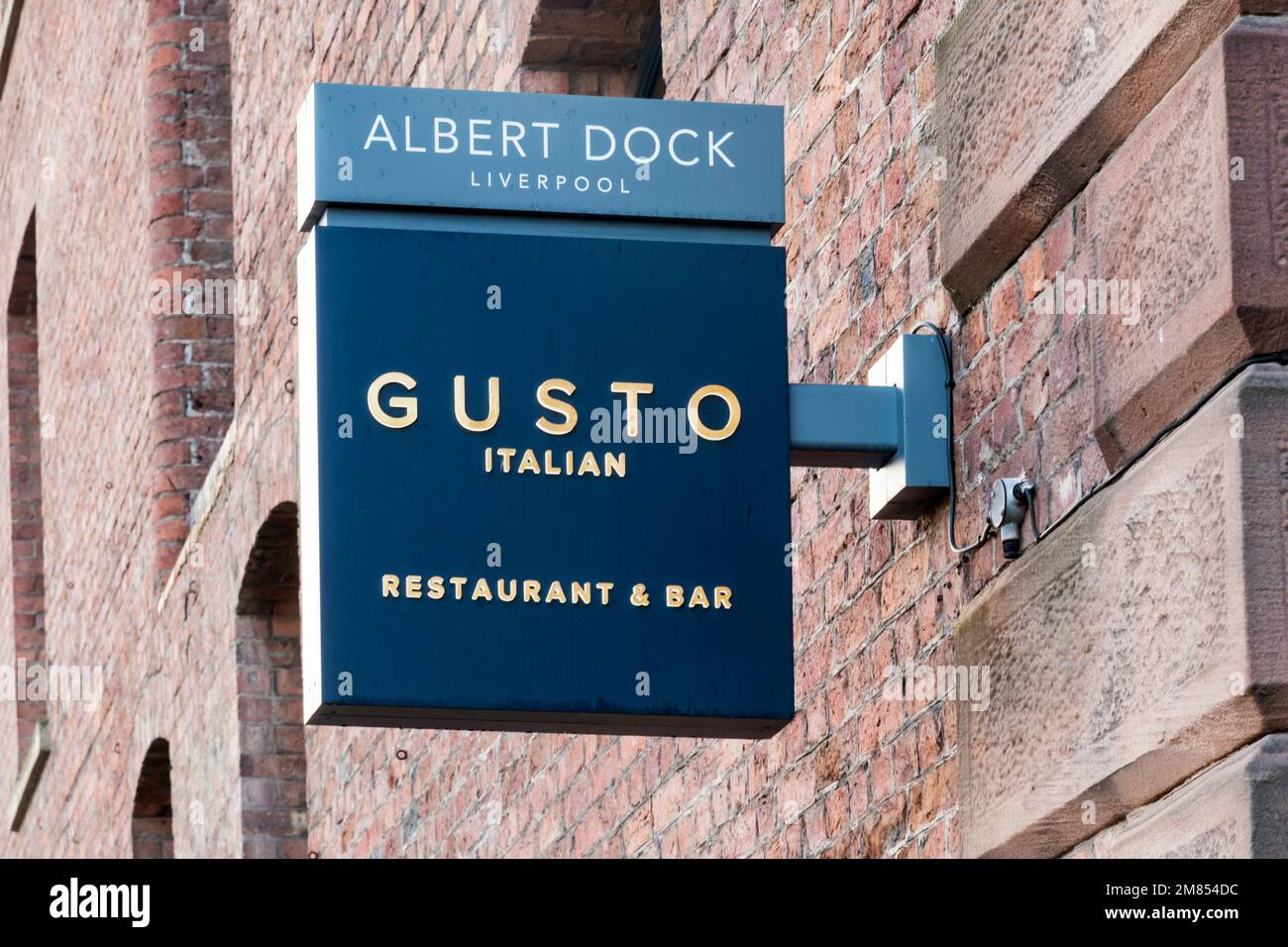 Sign for Gusto Italian restaurant & Bar in Albert Dock, Liverpool. Stock Photo