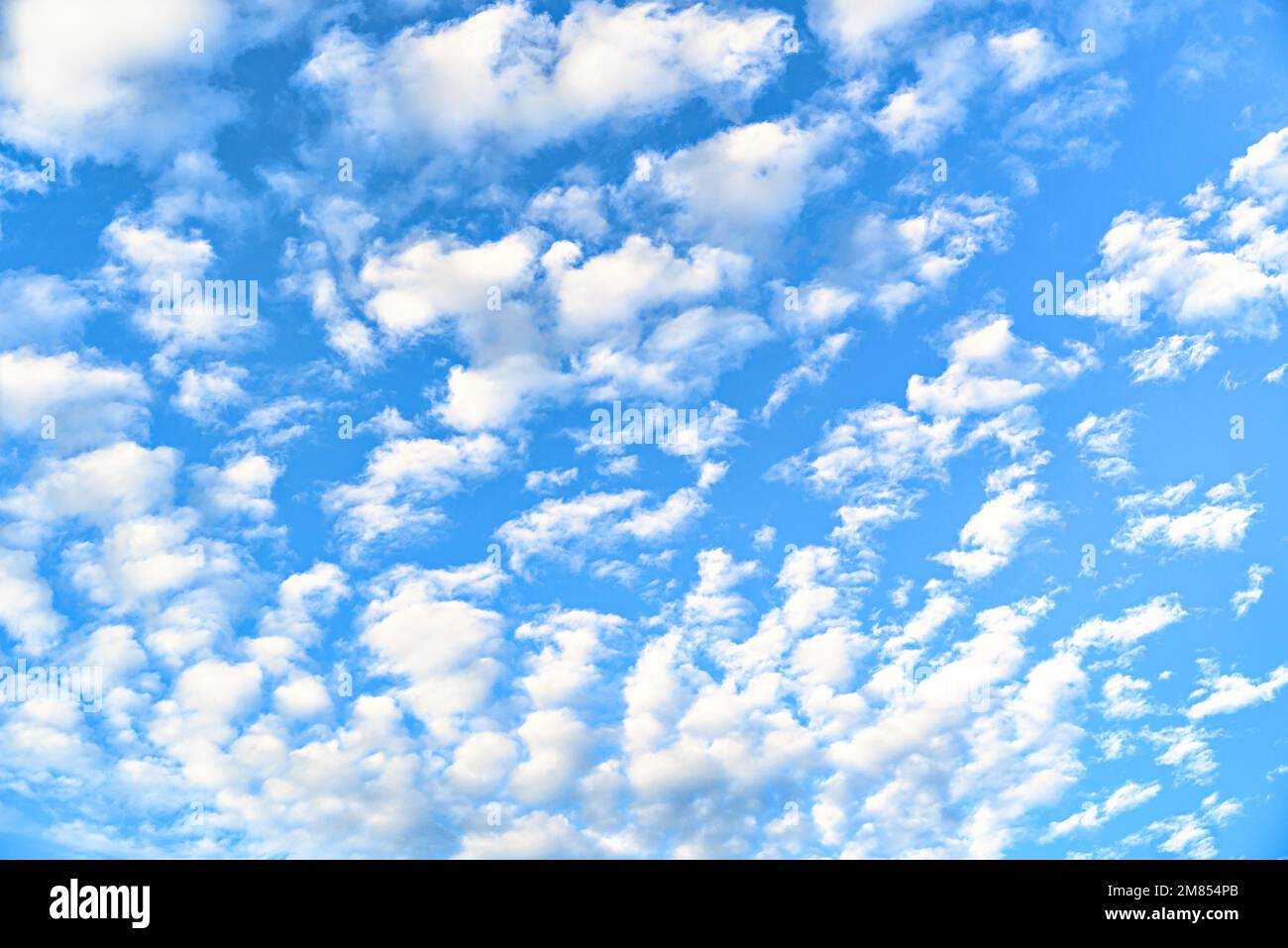 White clouds in a bright blue sky. The beauty of the nature Stock Photo ...