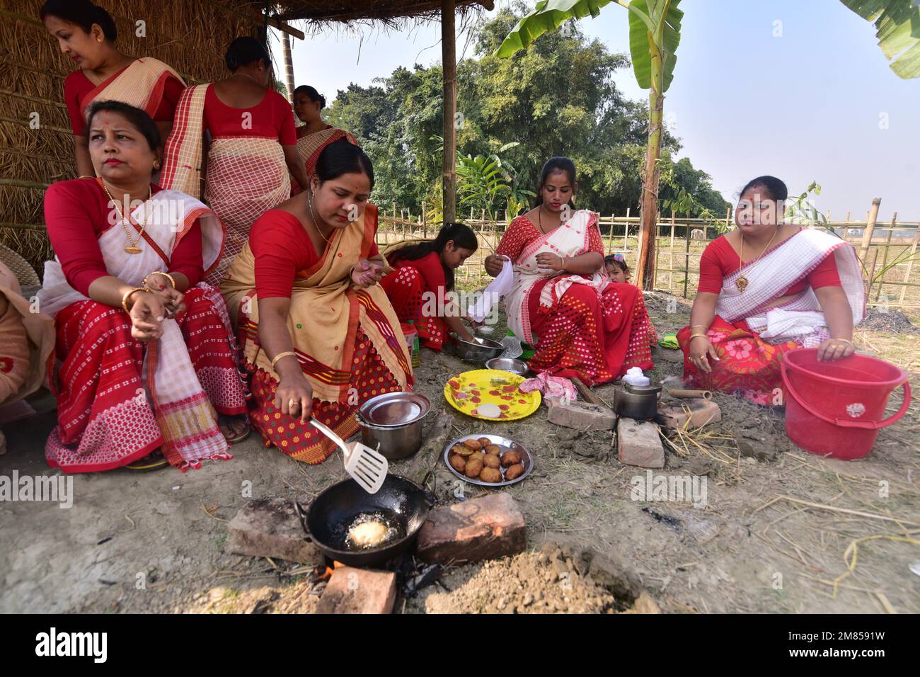 nagaon-12th-jan-2023-women-prepare-traditional-food-ahead-of-the