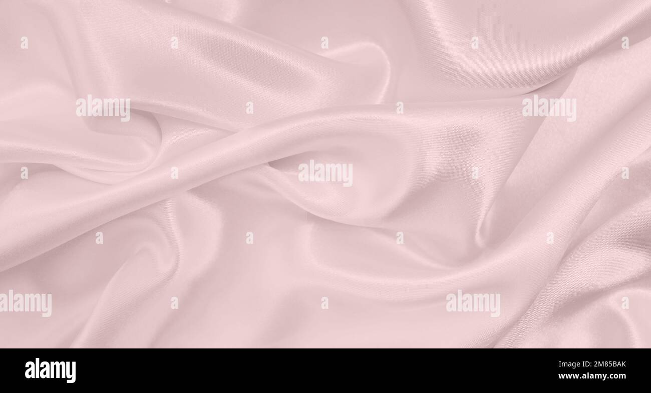Smooth elegant pink silk or satin texture can use as wedding background ...