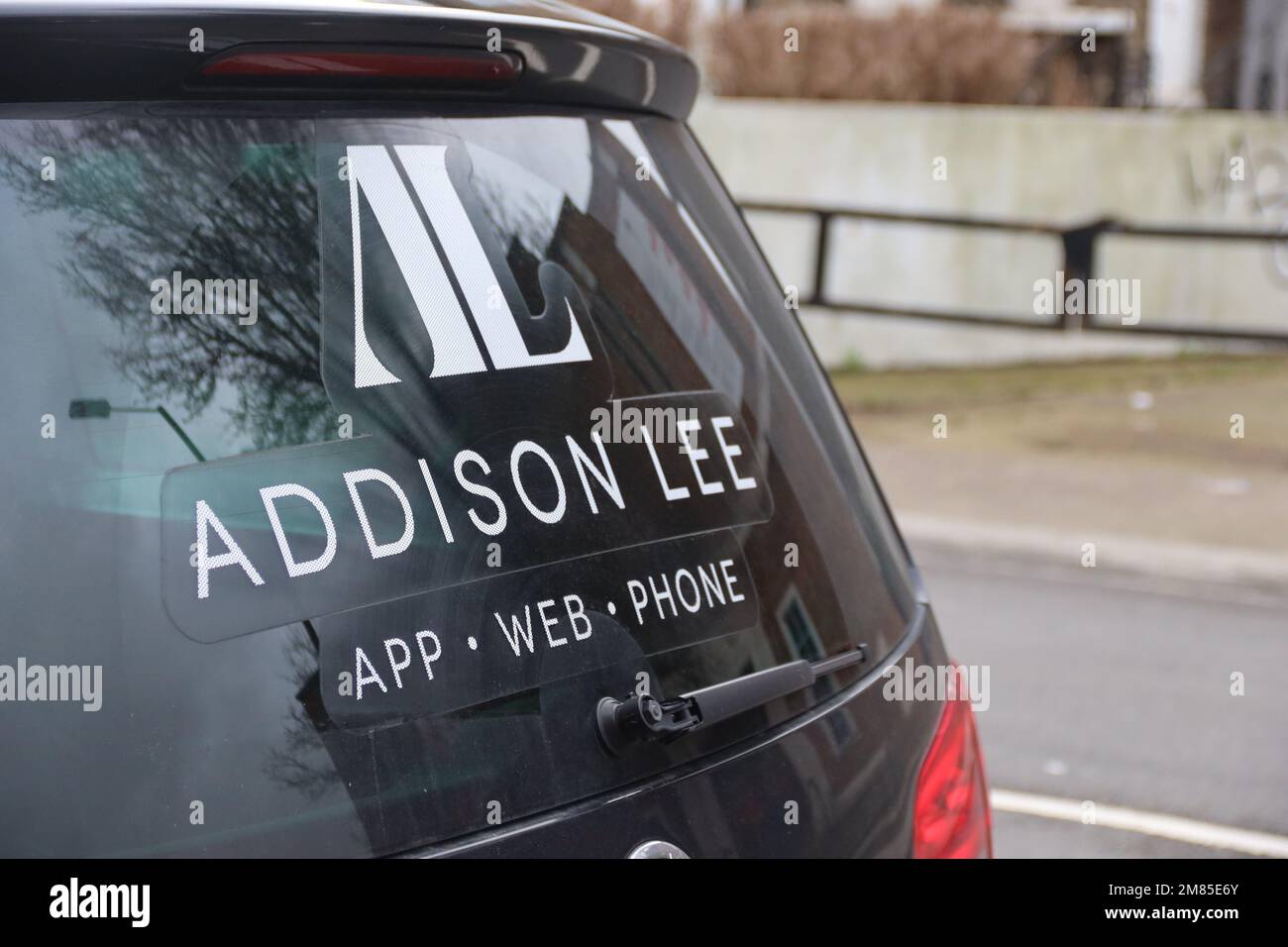 Addison Lee Taxi waiting for passengers in Shepherd's Bush, West London. Stock Photo