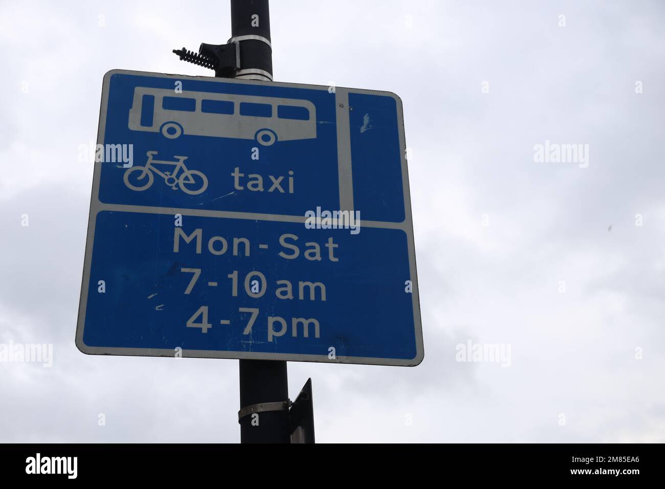 Road signs for buses lane taxis & bicycles only Stock Photo Alamy