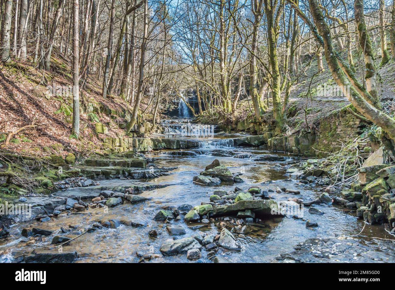Cascades on Bow Lee Beck leading to Summerhill Force waterfall in the background. Stock Photo