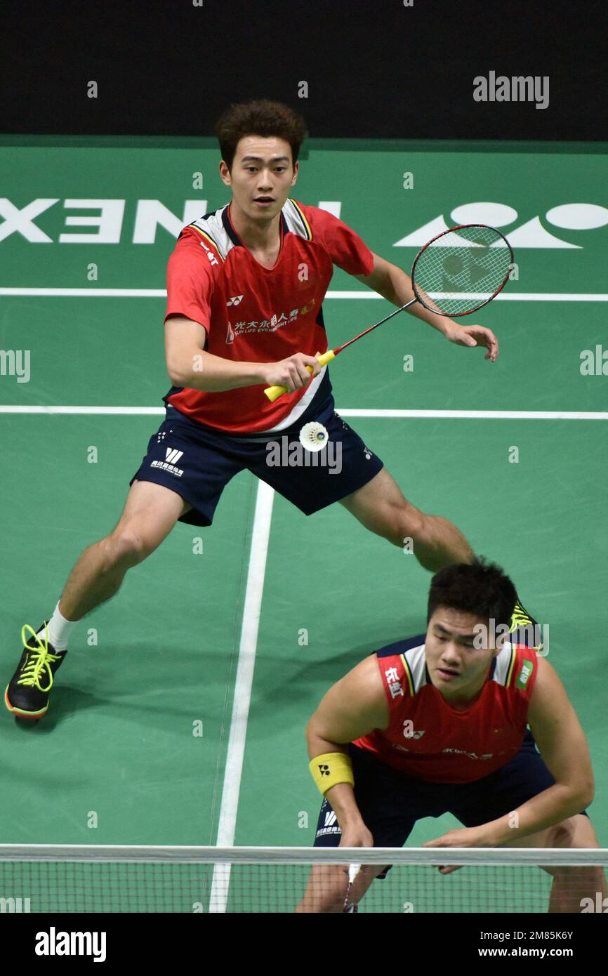 Indonesias Marcus Fernaldi Gideon, top, and Kevin Sanjaya Sukamuljo play against Malaysias Aaron Chia and Soh Wooi Yik during their mens doubles quarterfinal matchat the 2020 Summer Olympics, Thursday, July 29, 2021,